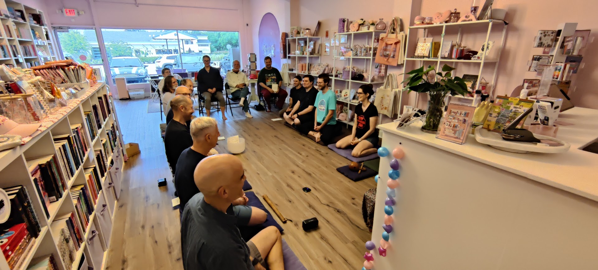 The OZC Sangha practicing in person at The New Romantics bookstore in Audubon Park.